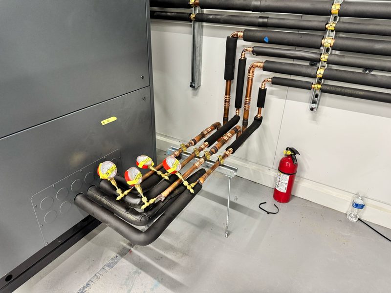 CRAC piping connections with test gauges