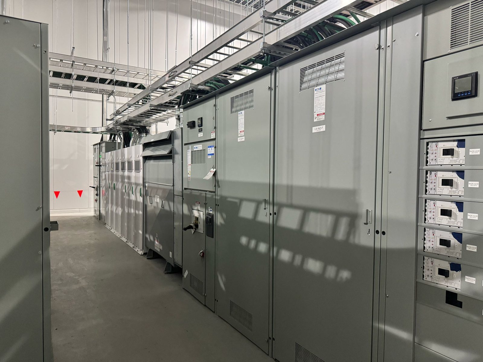 Switchgear lineup under the overhead cable tray