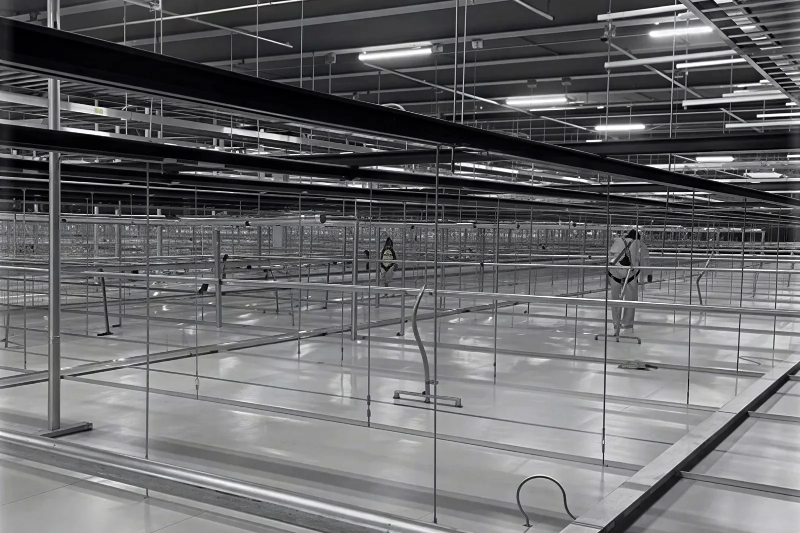 Ceiling grid and hanger rods before close-in